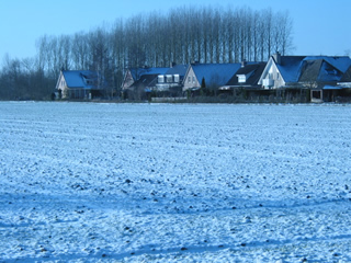 Huizen in de sneeuw